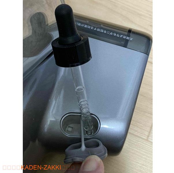 UWANT 布団クリーナーにダニ除去液を入れる